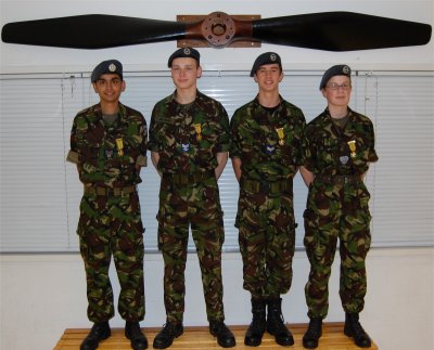 Members of the 107 Sqn Nijmegen team displaying the medals earned